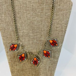 J crew colorful beaded necklace. 18” Sat on a clear diamond shaped background.